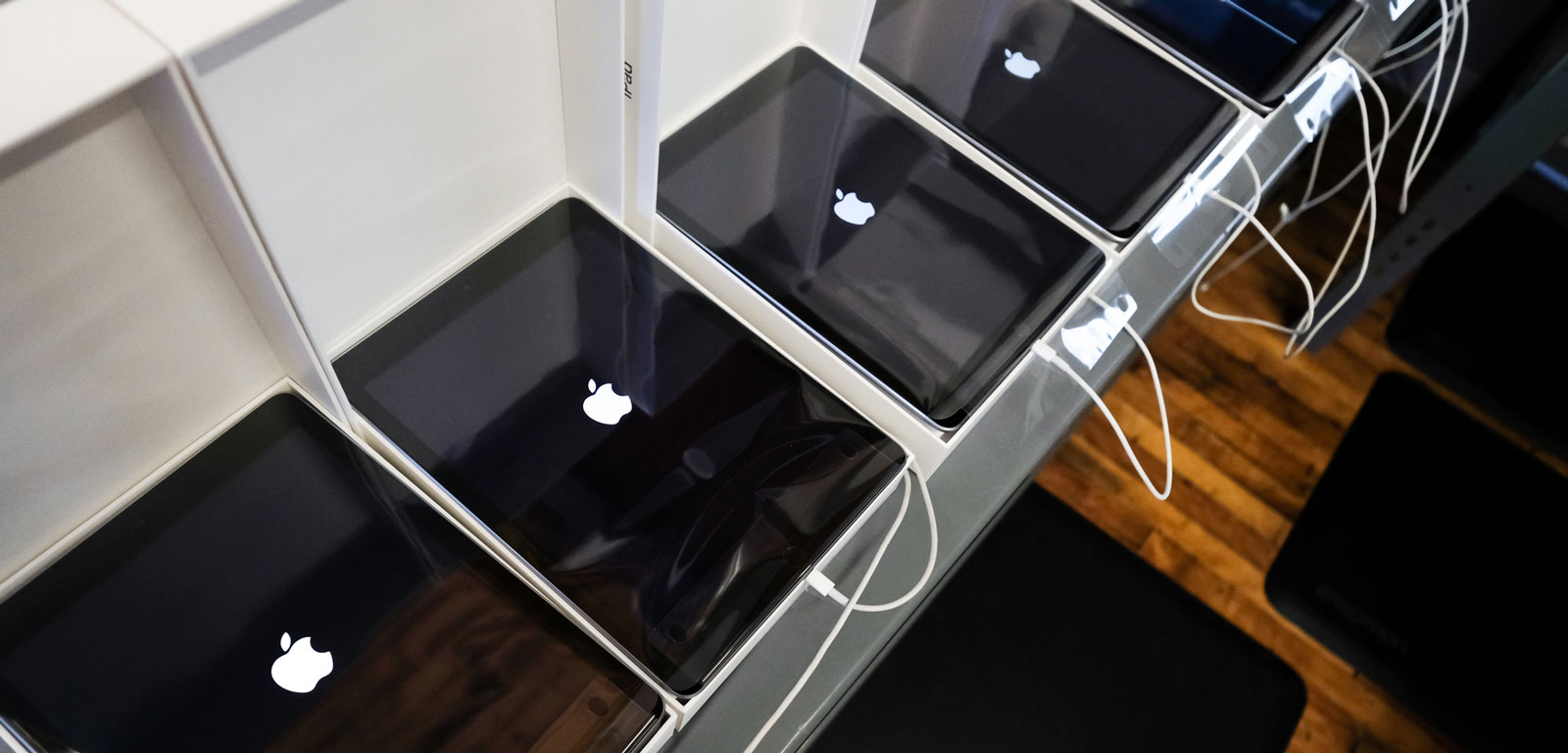 Line of iPads being configured